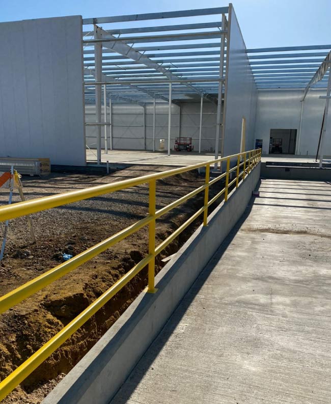commercial exterior painting on a retail store in Visalia, ca
