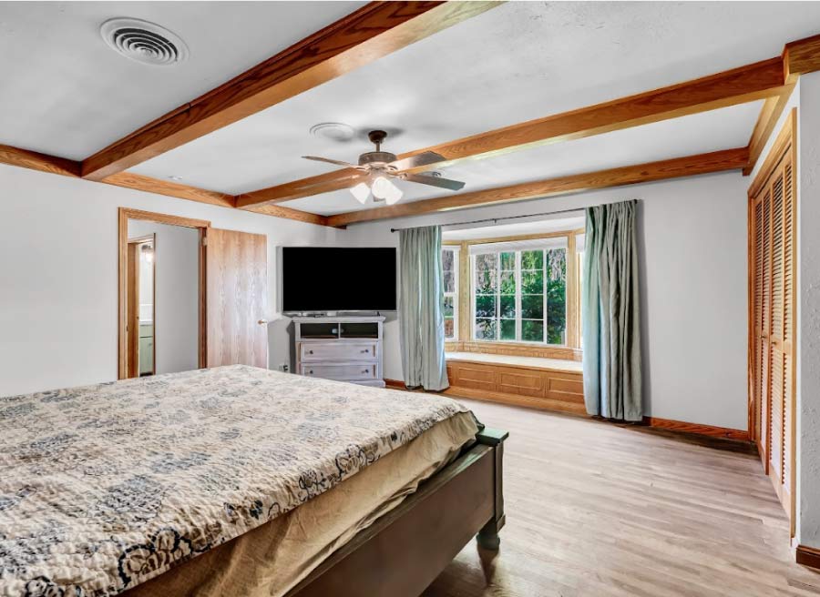 A beautifully painted bedroom in Dinuba, showcasing a flawless finish and vibrant new colors.